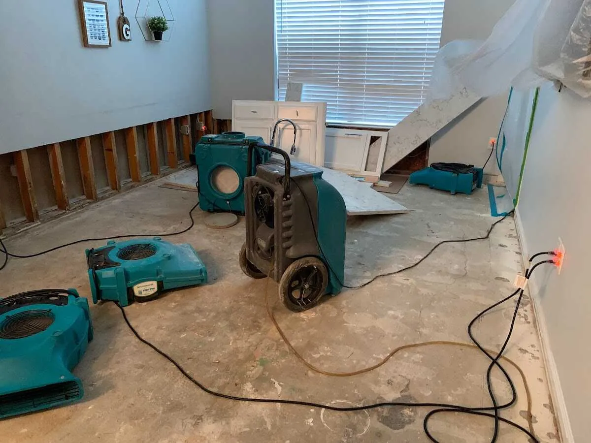Dehumidifier in flood-cut room for Water Damage Restoration in Riverside